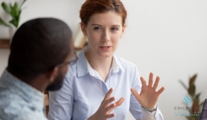 women talking to man business executive coaching