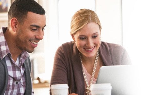 man and woman virtually engaged in an online coaching session